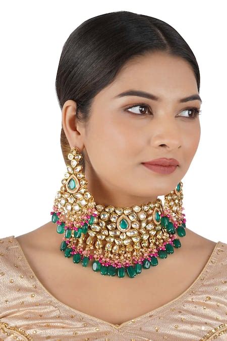 Buy Gold Plated Kundan Stone Carved Necklace Set by Chhavi's Jewels ...