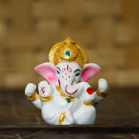 White Lord Ganesha Idol with Golden Mukut - eCraftIndia Online