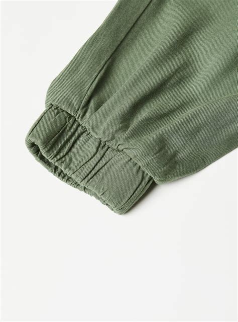 Buy Girls Solid Tie-Up Waist Joggers Online at just Rs. 599.0 ...