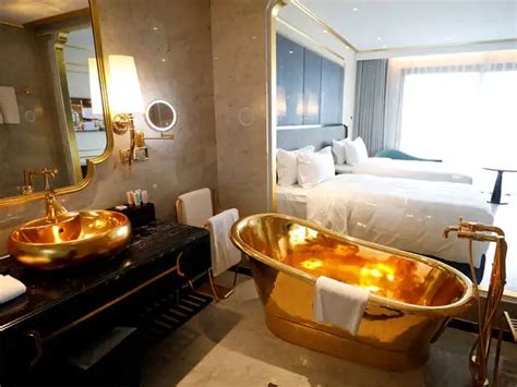 Golden treatment - Vietnam opens world's 'first' gold-plated hotel ...