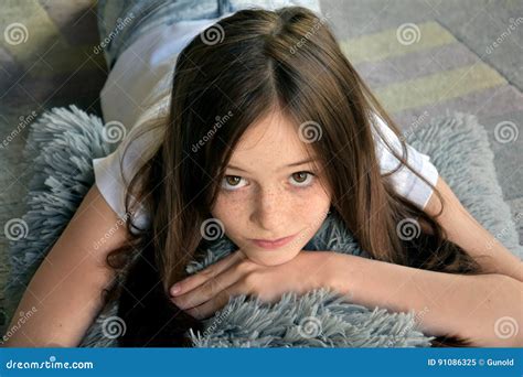 Girl is lying on the floor stock image. Image of female - 91086325