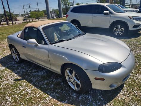 Joining the Mazda/Miata family this sunday :) 2001 NB2 Miata 5 speed with the tan leather ...