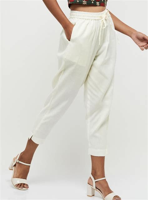 Buy Women Solid Drawstring Waist Straight Pants Online at just Rs. 499. ...