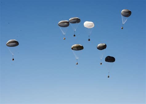 Airborne testers conduct airdrop tests of new container delivery system ...