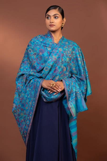 Buy Blue Paisley Floral Woven Shawl by Modarta Online at Aza Fashions.