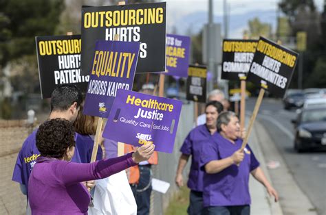 Kaiser Permanente workers protest healthcare giant’s planned layoffs in ...