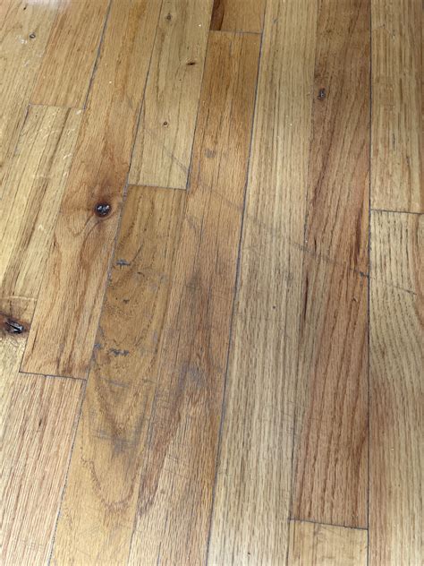 How to get scuff marks off wood flooring? The wood has that clear coat ...