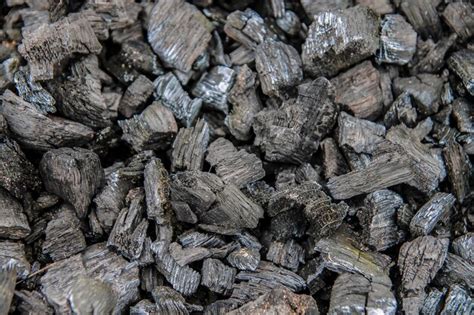 Natural black background pieces of charcoal. natural texture of natural ...