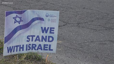 Neighbors retrieve 'We Stand with Israel' signs from storm drain after West Hartford vandalism ...