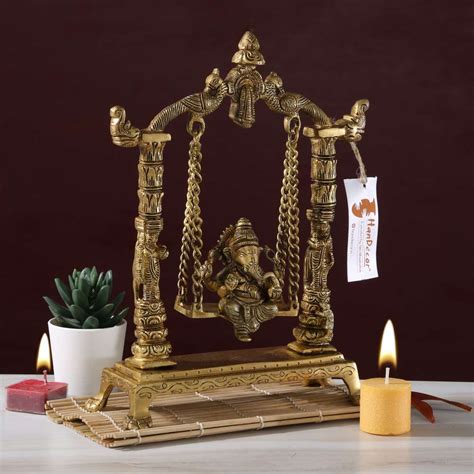 Buy Handcrafted Ethnic Pillar Design Ganesha on Swing Jhoola Premium ...