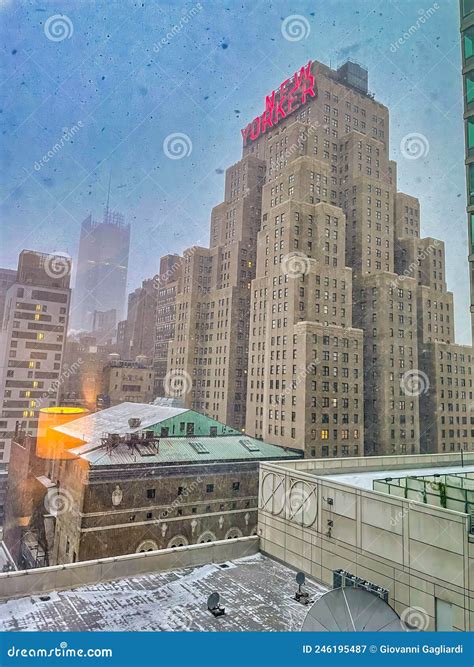 New York City - March 12, 2022: New Yorker Building at Night with Snow ...