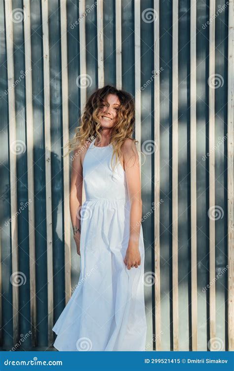 Portrait of a Beautiful Smiling Woman in a Summer Light Dress in the ...