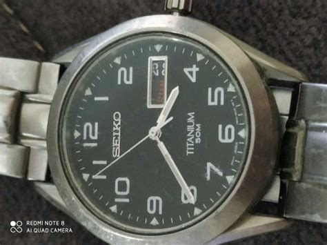 Vintage Seiko Titanium Quartz Day Date Watch with India | Ubuy