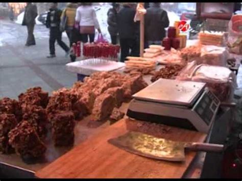 1231 新疆切糕卖家：买多少切多少 价高只因食材贵 - YouTube