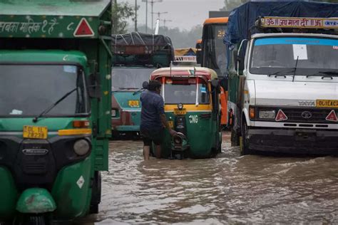 Heavy rains cause widespread disruption, floods and landslides in north ...