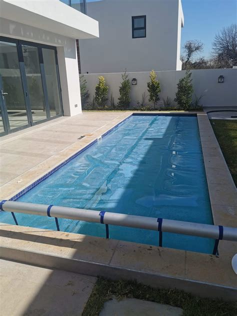 Image result for Commercial Solar Pool Covers