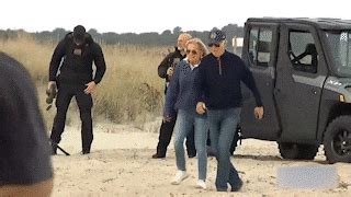 Watch: Joe Biden stumbles, nearly takes a tumble during stroll on sandy ...