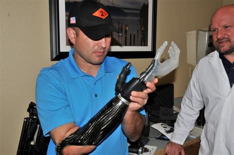 Sgt. 1st Class Leroy Petry gets fitted for a new prosthetic arm ...