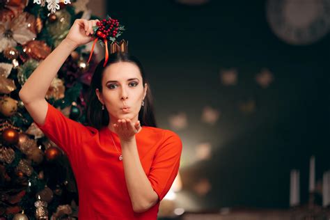 People Kissing Under The Mistletoe