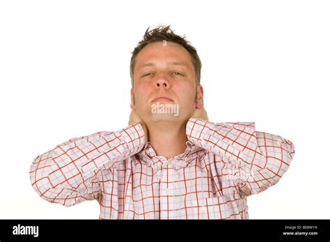 40 year-old man suffering from neck pain Stock Photo - Alamy