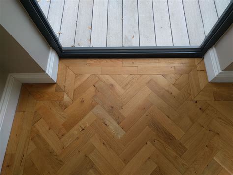 We fitted this oak parquet in a classic herringbone design with a ...