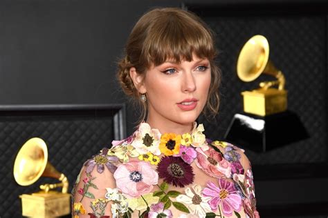 Taylor Swift brings flower power to the Grammys 2021 red carpet