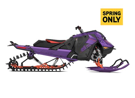 Rider riding up a snowy mountain on the 2027 Ski-Doo Summit