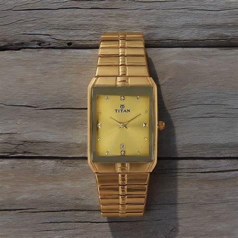 Buy Online Titan Golden Dial Analog with DateMetal Strap watch for Men ...