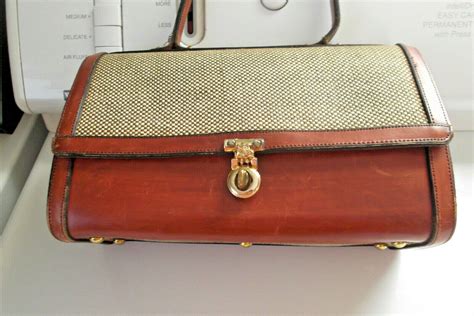 John Romain Handbags