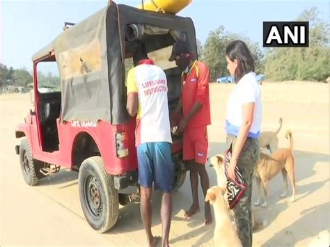 Lifeguard agency in Goa feeding canine friends on beaches