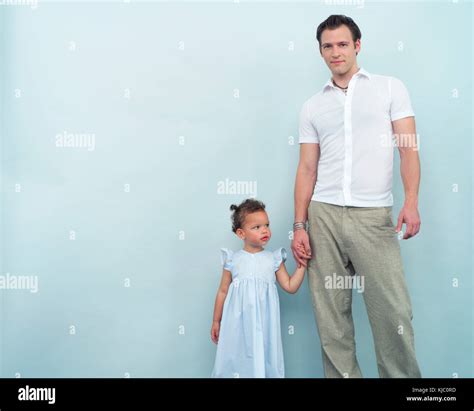 Father and Daughter Holding Hands Stock Photo - Alamy