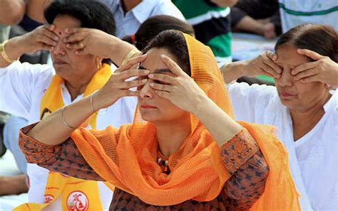 Members of Naval Staff take part in a mass yoga event to mark the 3rd ...