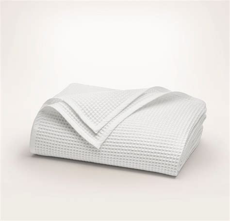 White Blanket On Bed