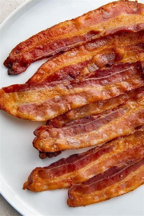https://40aprons.com/wp-content/uploads/2020/11/how-cook-bacon-oven-4.jpg?utm_source=chatgpt.com
