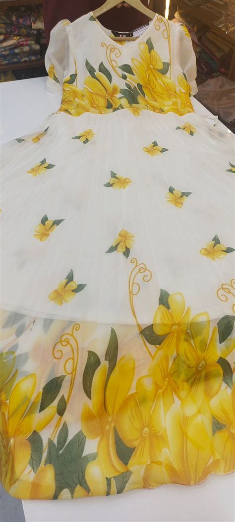 Georgette frocks with floral design and pleated design across the wais ...