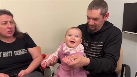 10-month-old baby who was born deaf hears parents for first time