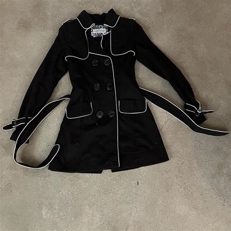 Women’s small trench coat. Black with white outline... - Depop