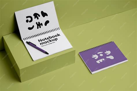 Premium PSD | Paper kraft spiral notebooks on geometrical display