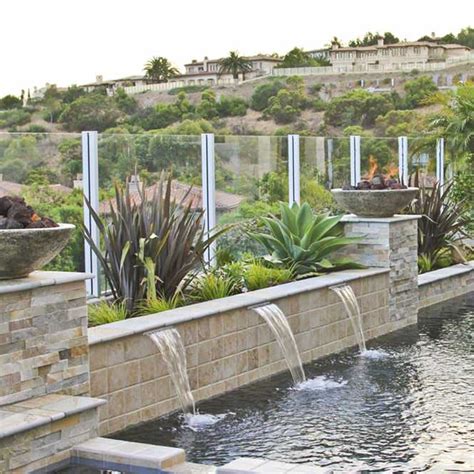 https://st.hzcdn.com/fimgs/pictures/pools/swan-pools-swimming-pool-company-water-feature-sheer-descent-swan-pools-southern-california-img~d741b15201421e9c_5933-1-d398b92-w666-h666-b2-p0.jpg