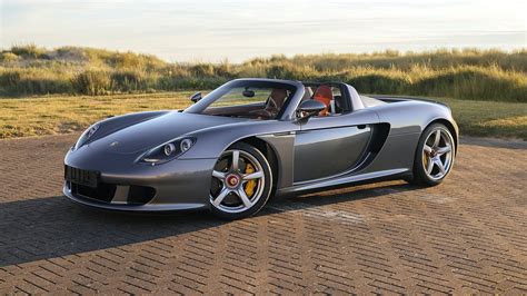 Jenson Button’s Porsche Carrera GT sells big at auction - Motoring Research