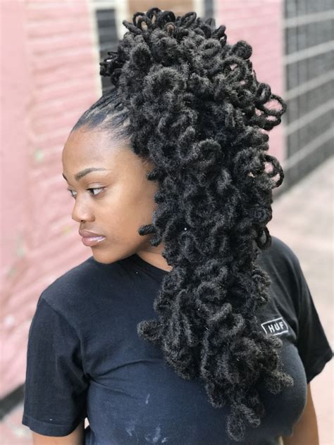 Locs with curly ponytail | Dreadlocks ponytail hairstyles, Feminine loc ...