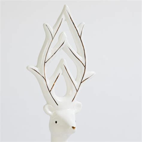 Buy Brighton Ceramic Textured Sitting Reindeer Figurine from Home ...