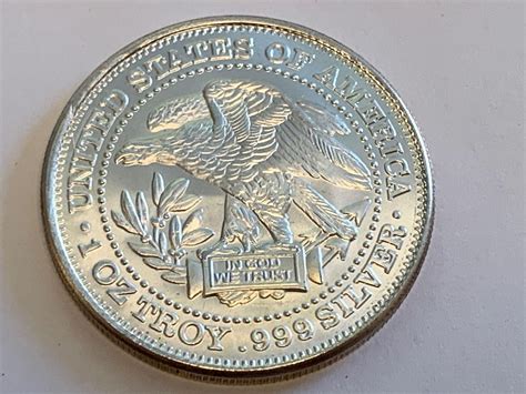 USA one troy ounce .999 Silver Round - A D Auction Depot Inc.