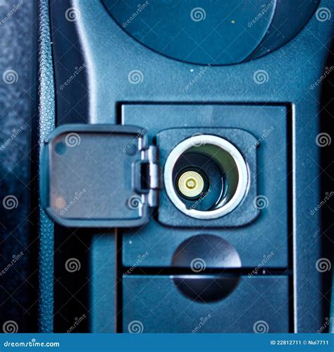 12 V power outlet in a car stock image. Image of current - 22812711