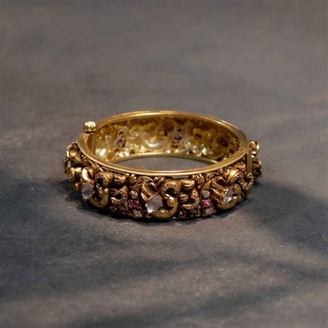 Shop Dhowmya Temple Kada 92.5 Silver Gold Plated Polki Bangle Chennai