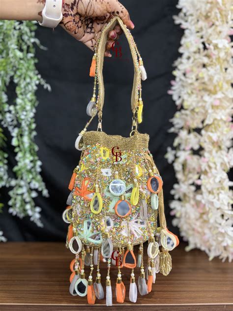 Multi Mirror Drop Potli - Gold, Red and Grey – colorsandbraids