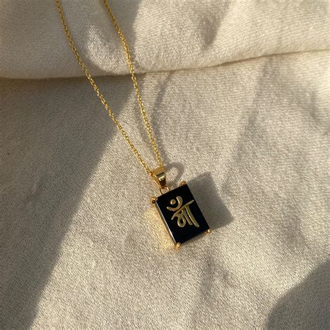 Maa Pendant – Gold-Plated Black Onyx, 92.5 Silver