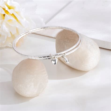 Buy Sculpted Affection Rhodium-Plated Silver Bangle – Zavya