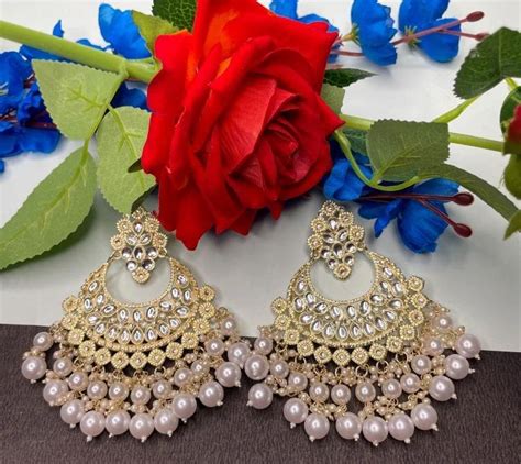 M.K Jewellers - Ladies Light Pink Designer Drop Earrings Supplier from ...