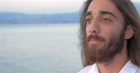 Man with long hair and beard on sea background 30742888 Stock Video at ...